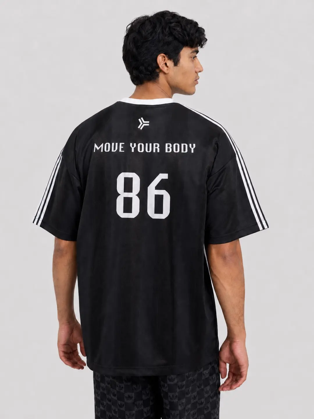 Back of Move Your Body 86 black Chicago House Athletic Club jersey